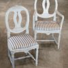 Laurine and Carver chairs in white with grey striped fabric